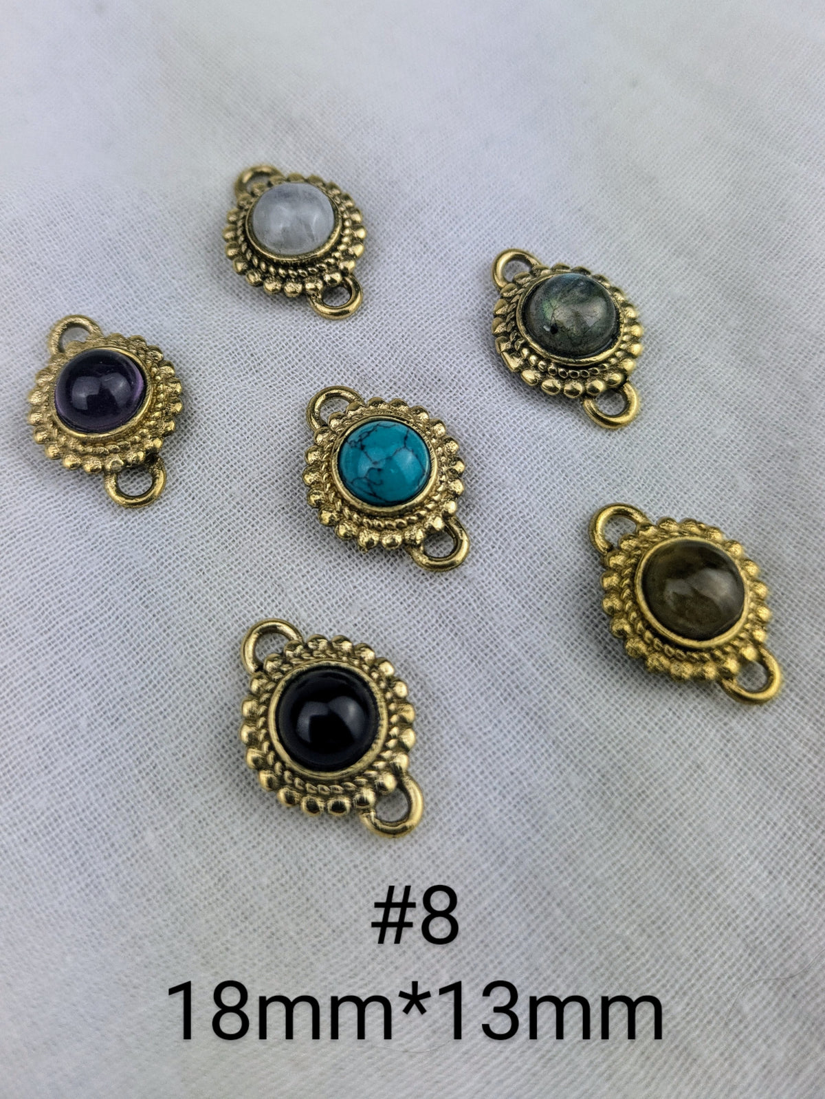 Charm mit Edelsteinfassung