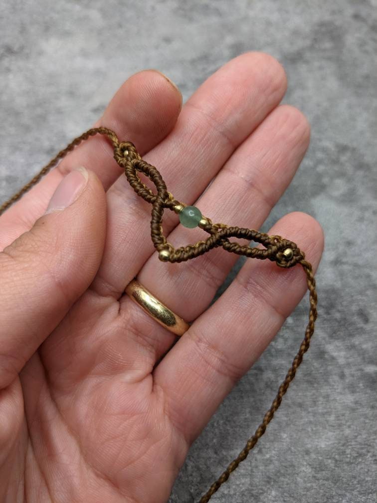 minimalistischer brauner hippie kopfschmuck mit steinperle