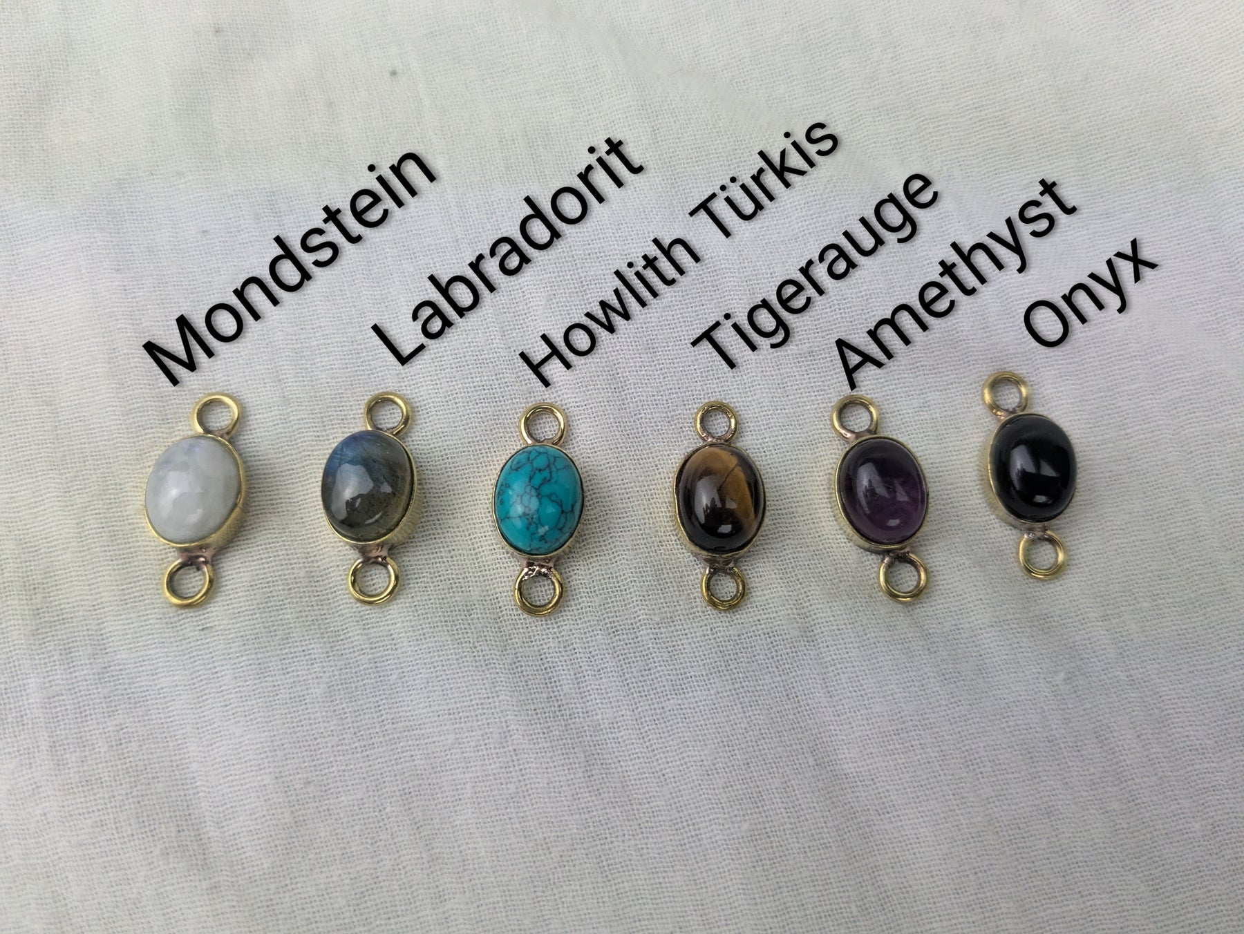 Charm mit Edelsteinfassung