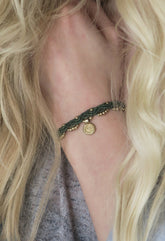 Makramee Armband mit goldener messingsonne im orientalischen stil